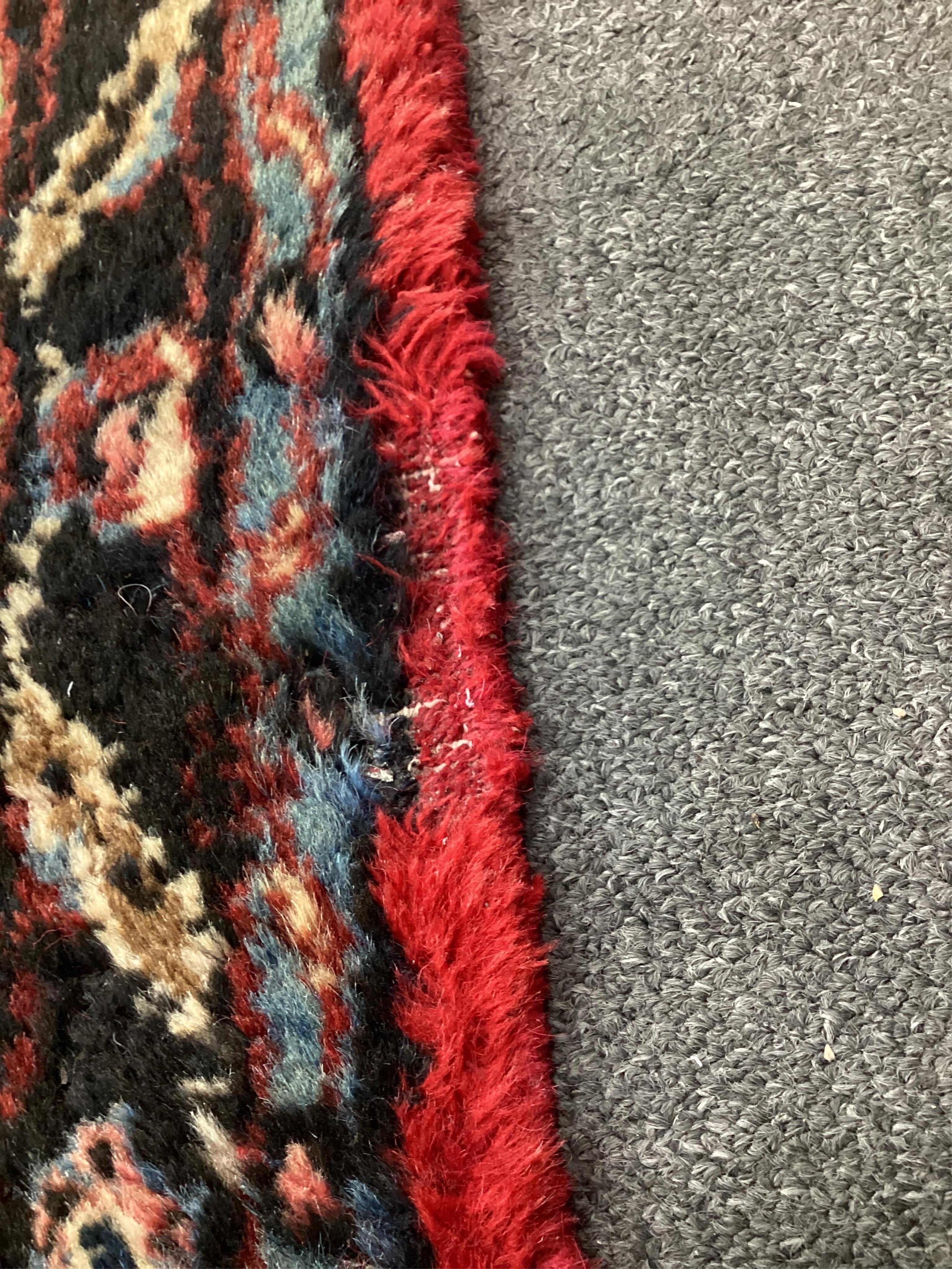 A Hamadan red ground carpet, 475 x 275cm. Condition - a couple of small patches of old moth damage